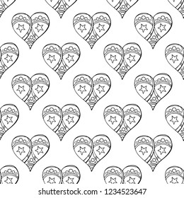 Seamless festive pattern with hand-drawn christmas gingerbread hearts. Endless traditional texture for Christmas design, fabrics, wallpapers, greeting cards, wrappings. Vector monochrome illustration.