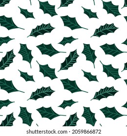 Seamless festive pattern with holly leaves on a white background. Vector pattern. Festive background for fabric, clothing, wallpaper, wrapping paper, stationery.