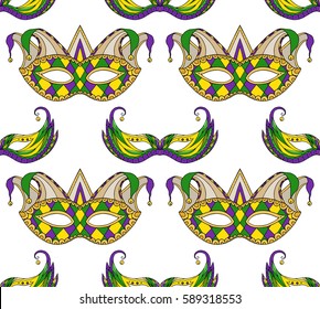 Seamless festive pattern with masks. Vector texture on the Mardi Gras holiday for your creativity