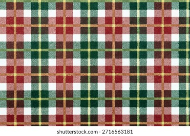 Patrón de tartán festivo sin fisuras con cuadros rojos, verdes y blancos. Textura clásica a cuadros para el abrigo del regalo de Navidad, la moda del invierno, la tela de la franela, y los fondos del día de fiesta.