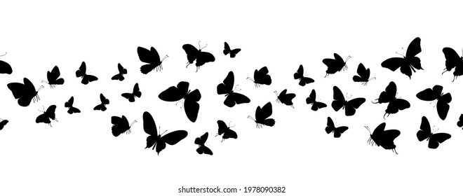 Seamless flock of silhouette black butterflies on white background. Vector