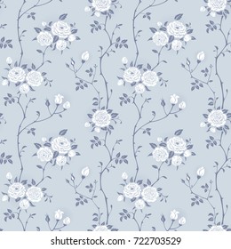 Seamless floral background with branches of climbing roses. Gray and white pattern for wallpaper, fabric, digital paper, fills, etc. Shabby chic style.