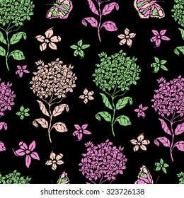 Seamless floral background with butterflies.