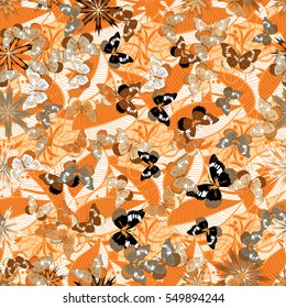 Seamless floral background. Fantasy flowers and paisley mix. Orange brown flowers and leafs on dark orange background. Vector illustration.