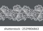 Seamless floral background with lace flowers.Vector hand made lace ribbon with flowers