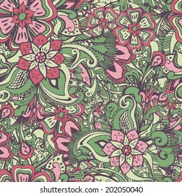 Seamless floral background in pink and green colors