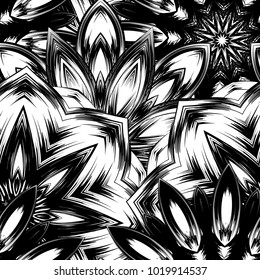 Seamless floral background. Tracery handmade nature ethnic fabric backdrop pattern with saturated dark flowers. Textile design texture. Decorative binary monochrome black and white art. Vector