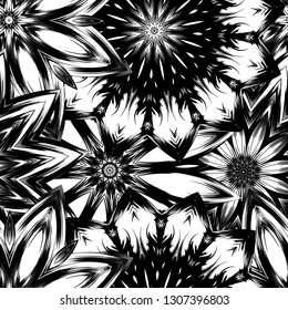 Seamless floral background. Tracery handmade nature ethnic fabric backdrop pattern with saturated dark flowers. Textile design texture. Decorative binary monochrome black and white art. Vector