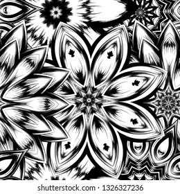Seamless floral background. Tracery handmade nature ethnic fabric backdrop pattern with saturated dark flowers. Textile design texture. Decorative binary monochrome black and white art. Vector