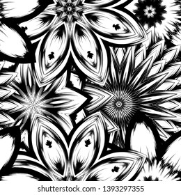 Seamless floral background. Tracery handmade nature ethnic fabric backdrop pattern with saturated dark flowers. Textile design texture. Decorative binary monochrome black and white art. Vector
