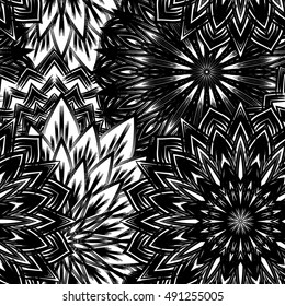 Seamless floral background. Tracery handmade nature ethnic fabric backdrop pattern with flowers. Textile design texture. Decorative binary monochrome black and white art. Vector.