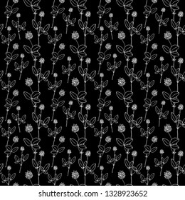 Seamless floral black and white pattern. Contour drawing of clover flowers. Pattern for decoration of fabric, paper, Wallpaper. St. Patrick's day.