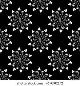 Seamless floral geometrical pattern. Vector illustration. Round botanical mandalas made of buttercup flowers. Delicate white silhouettes on black background.