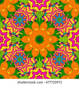 Seamless floral mandala pattern in pink, turquoise blue and pale orange. Yellow and orange mandala.