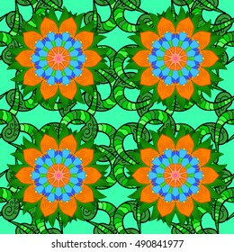 Seamless floral mandala pattern in pink, turquoise green, blue and pale orange on floral orange background.