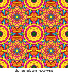 Seamless floral mandala pattern in pink, turquoise blue and pale orange. Vector.