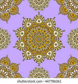 Seamless floral mandala pattern in shades of yellow & orange on pale purple background. Vintage vector ornamental print with Oriental style elements of Indian/Arabic/Ottoman/Moroccan decorative arts.