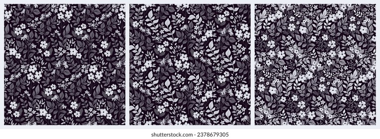 Seamless floral pattern, abstract ditsy print with drawing wild plants in the collection. Pretty botanical design in gray colors: small hand drawn flowers, leaves, grass on black. Vector illustration.