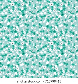 Seamless floral pattern. Background in small flowers for textiles, fabrics, cotton fabric, covers, wallpaper, print, gift wrapping, postcard, scrapbooking