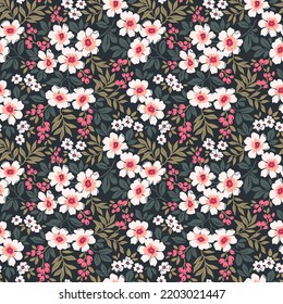 Seamless floral pattern. Beautiful bouquet of small flowers and leaves. Bright flowers on black background in trendy fashion oriental style. Stock vector for prints.