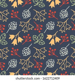 Seamless floral pattern with bells, clover and leaves on a dark blue background with red, yellow and blue elements, elegant, harmonious for textile design and use as a print