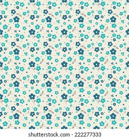 Seamless floral pattern. Blue and azure flowers on a cream background