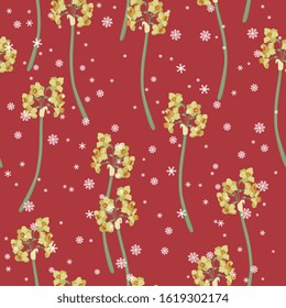 Seamless floral pattern with branches of yellow narcissus or daffodil flower and snowflakes.
