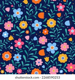 Seamless floral pattern with bright colorful flowers, plants and branches on a dark blue background.