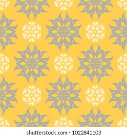 Seamless floral pattern. Bright yellow background with flower designs for wallpapers, textile and fabrics