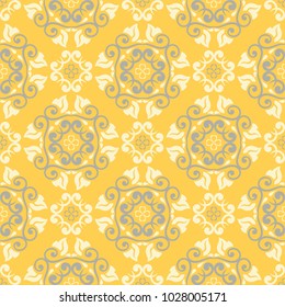 Seamless floral pattern. Bright yellow background with flower designs for wallpapers, textile and fabrics