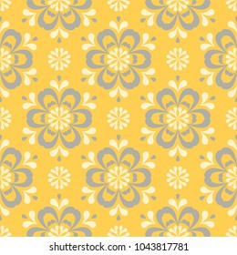 Seamless floral pattern. Bright yellow background with flower designs for wallpapers, textile and fabrics