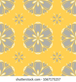 Seamless floral pattern. Bright yellow background with flower designs for wallpapers, textile and fabrics