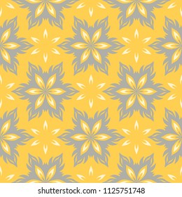 Seamless floral pattern. Bright yellow background with flower designs for wallpapers, textile and fabrics