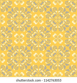 Seamless floral pattern. Bright yellow background with flower designs for wallpapers, textile and fabrics