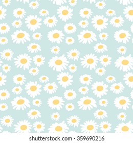 Seamless floral pattern with chamomiles on blue background