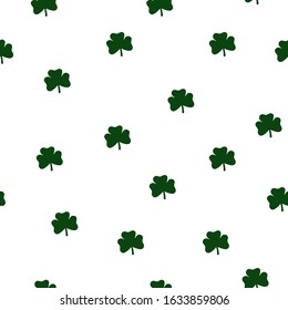 Seamless floral pattern. Clovers isolated on a white background. Symbol of good luck, success, money, St. Patrick's Day. Vector illustration for traditional Irish holiday, wallpaper, wrapping paper