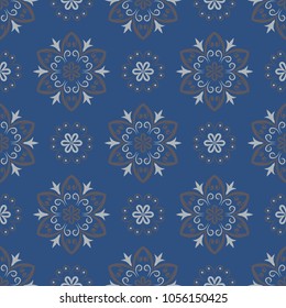 Seamless floral pattern. Dark blue background with flower designs for wallpapers, textile and fabrics