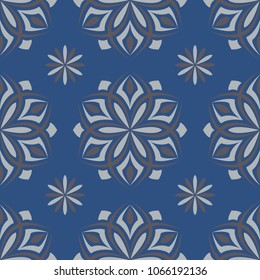 Seamless floral pattern. Dark blue background with flower designs for wallpapers, textile and fabrics