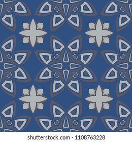 Seamless floral pattern. Dark blue background with flower designs for wallpapers, textile and fabrics