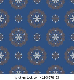 Seamless floral pattern. Dark blue background with flower designs for wallpapers, textile and fabrics