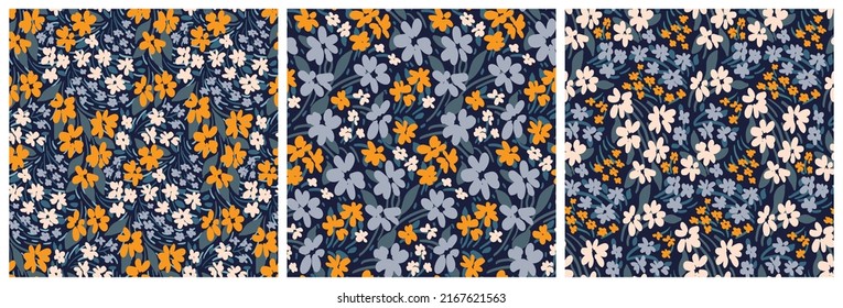 Seamless floral pattern, decorative ditsy print with small blue field flowers in a set. Trendy botanical background with rustic meadow, small plants, flowers, leaves. Vector illustration.