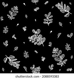 Seamless floral pattern with decorative white flowers, branches, grass and leaves. Black isolated background. Botanical print. Great for fabrics, textiles, cards.