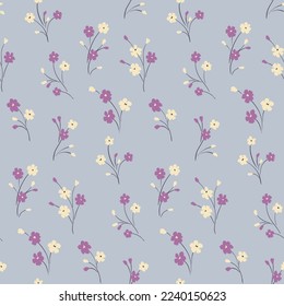 Seamless floral pattern, delicate ditsy print with simple small plants in liberty composition on a gentle blue background. Pretty flower design with tiny hand drawn flowers on thin stems. Vector.