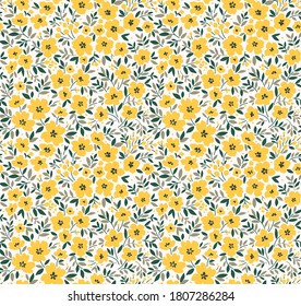 Seamless floral pattern for design. Small yellow flowers. White  background. Modern floral pattern. elegant template for fashion prints.