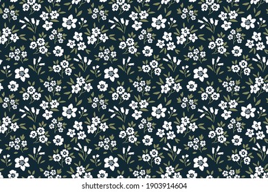 Seamless floral pattern for design. Small white flowers. Navy blue background. Modern floral pattern. Elegant template for fashion prints. Stock vector.