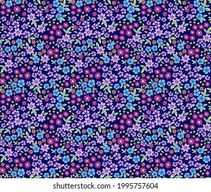 Patrón floral sin foco. El fondo de las pequeñas flores moradas es pequeño. Flores a pequeña escala esparcidas sobre un fondo azul violeta. Vector de material para imprimir en superficies y diseño web.