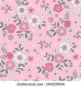 Seamless floral pattern. Ditsy background of small white and bright pink flowers. Small-scale flowers scattered over a pink background. Stock vector for printing on surfaces and web design.