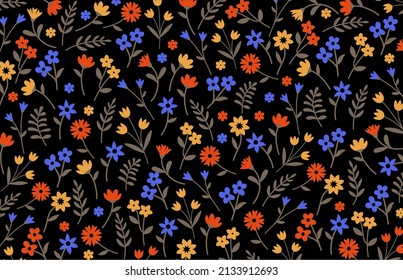 Seamless floral pattern. Ditsy background of small  flowers and green leaves. Small-scale flowers scattered over a back background. Stock vector for printing on surfaces, fabrics and web design.
