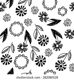 Seamless floral pattern.Ink drawing by hand in one color. Flowers and roundels.Vector image.
