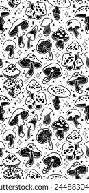 Seamless floral pattern of drawn black mushrooms on a white background